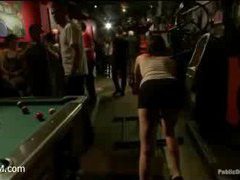An anal whore disgracefully fucked in a crowded bar