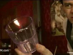 A horny slut slave performs pole dance for her master