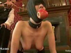 Charming house slaves get their clits worked hard