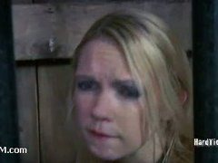 A blond whore fucking herself with an ass hook