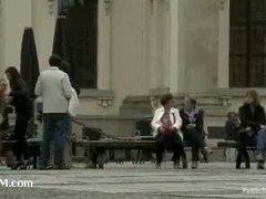 A luscious brunette gets her juicy ass spanked in public