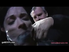 A big titted brunette brought to tears by two devious masters