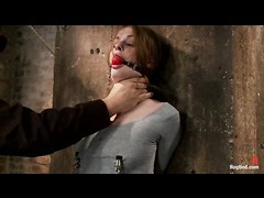 A fiery redhead gets her puffy nipples clamped in tight bondage