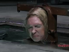 A blonde slave experiences painful pleasure before her long work day