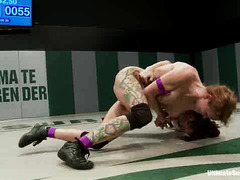 Rain DeGrey and Bella Rossi engage in a brutal, nude wrestling match
