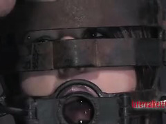 A restrained beauty sucks her Dom's cock before taking it deep in her cunt