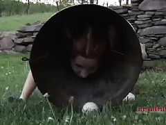 A sexy redhead is eager to please her Master with doggy games