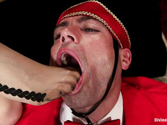 Maitresse Madeline seduces a hapless bellhop with her pretty feet