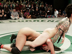 Team Dragon and Team Nightmare square off on the wrestling mat