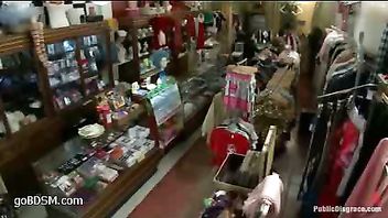 a gorgeous busty blonde gangbanged in a shop