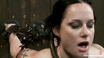 A busty babe finds her limits in intense bondage torture
