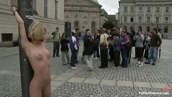 A hot European blonde stripped and handcuffed for rough public sex