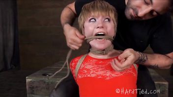 Ass and pussy toys are used to help this bound blonde orgasm